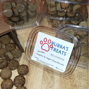 Bubba's Treats package amid actual treats on butcher block wood